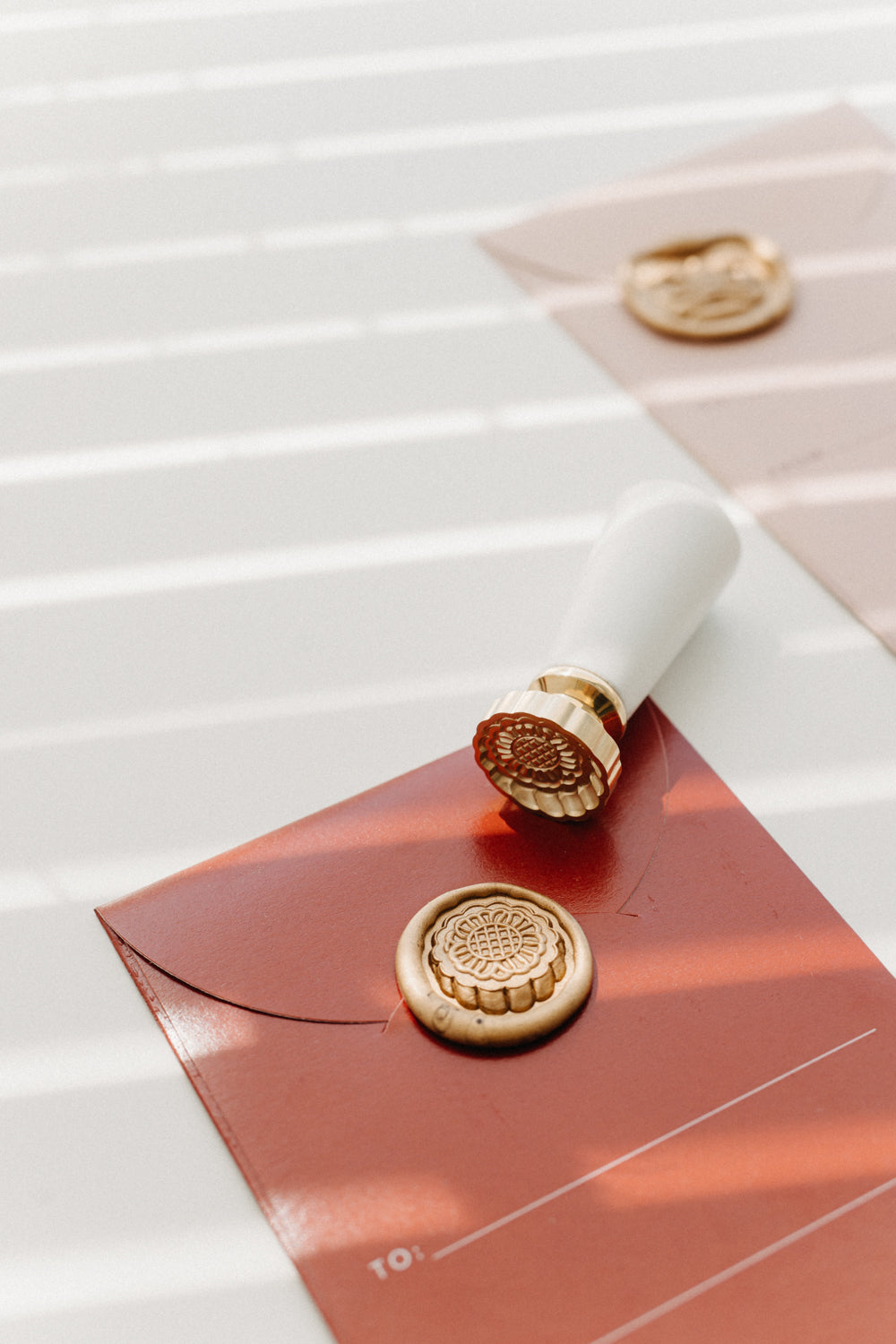 Gold mooncake wax seal stamp with white handle for Mid-Autumn Festival envelopes