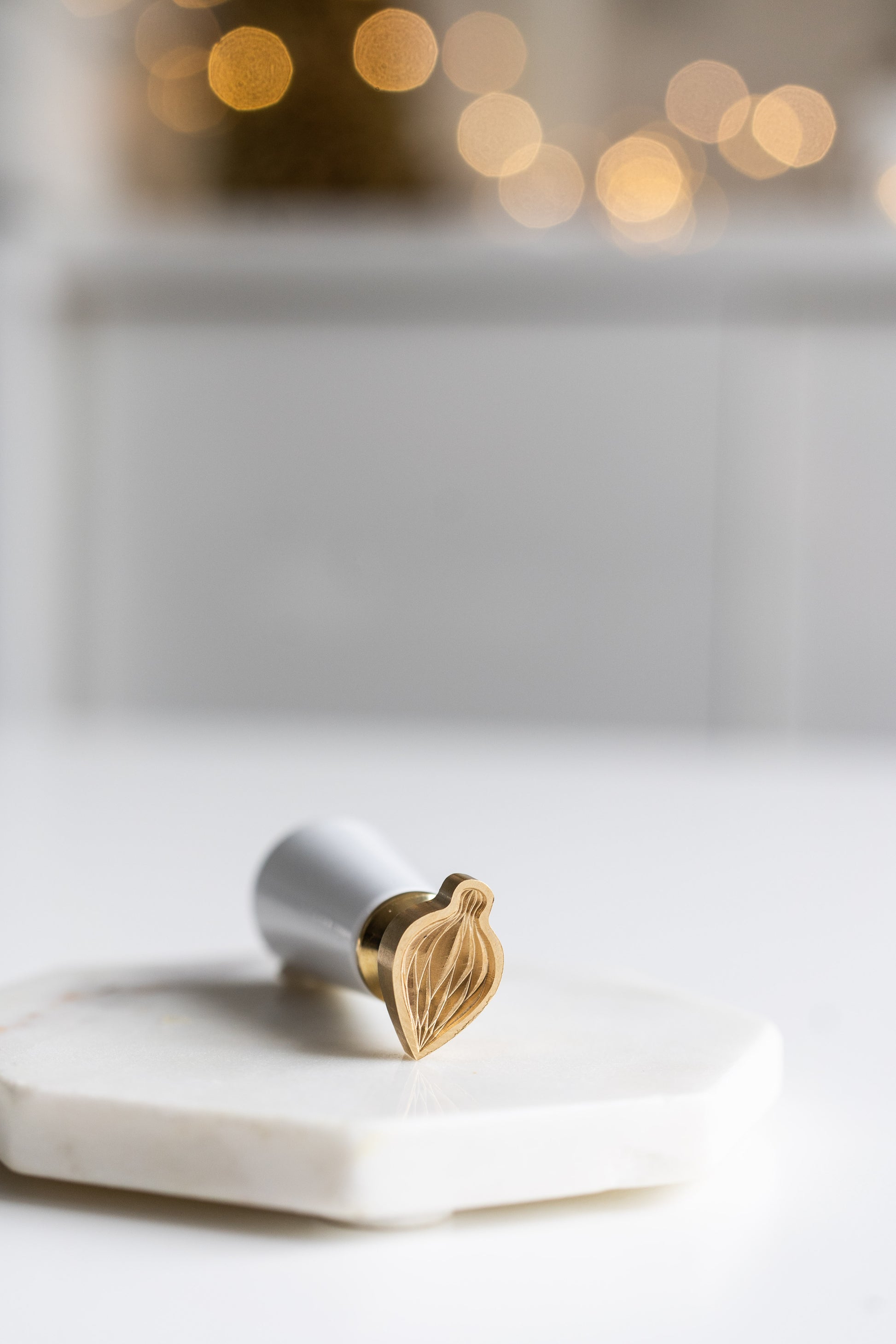 A festive ornament wax seal stamp, perfect for holiday greetings and gift wrapping.
