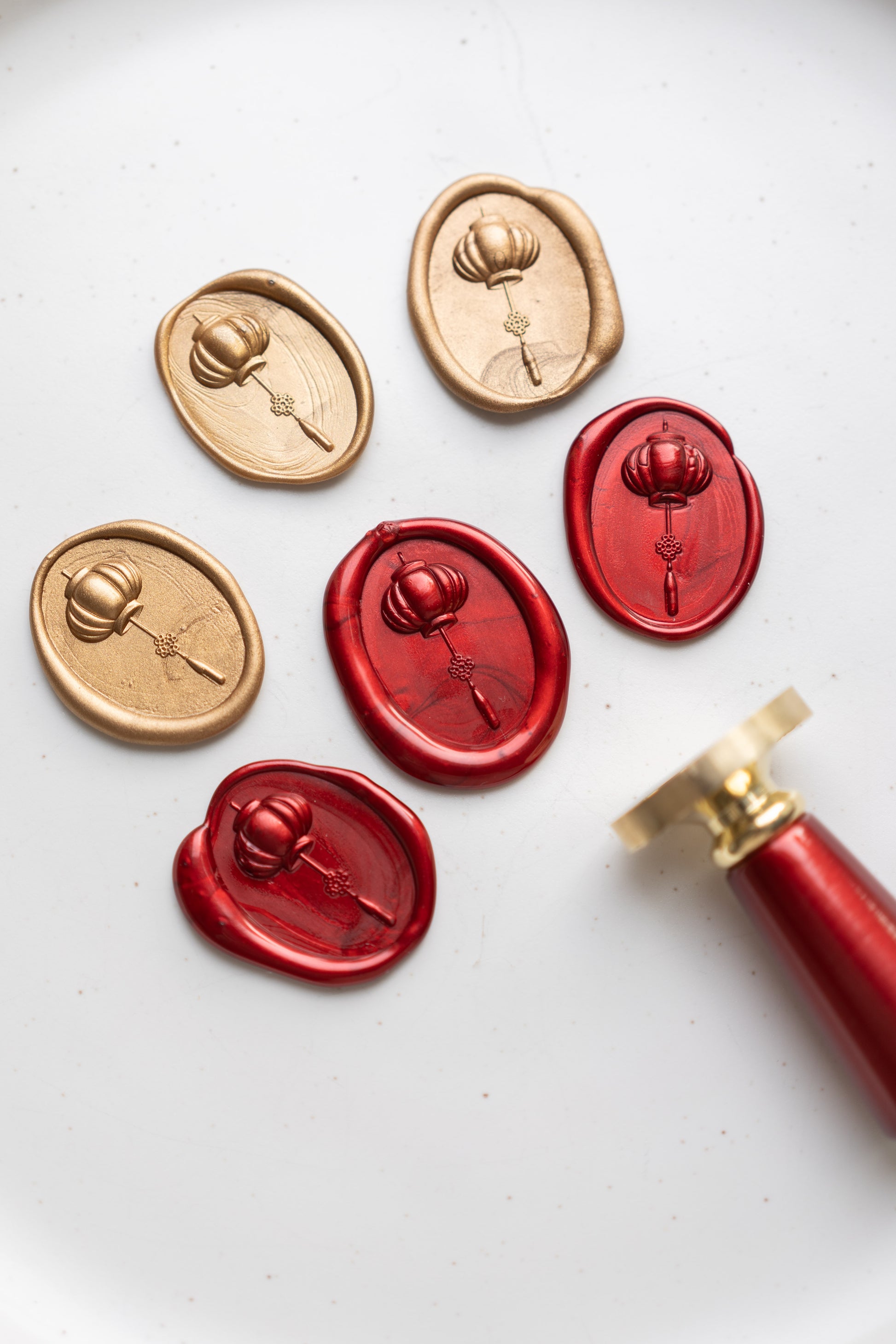 Lunar New Year wax seals with lantern design in red and gold for festive stationery