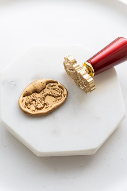 Gold dragon wax seal with brass stamp on marble, Lunar New Year sealing wax for invitations and stationery