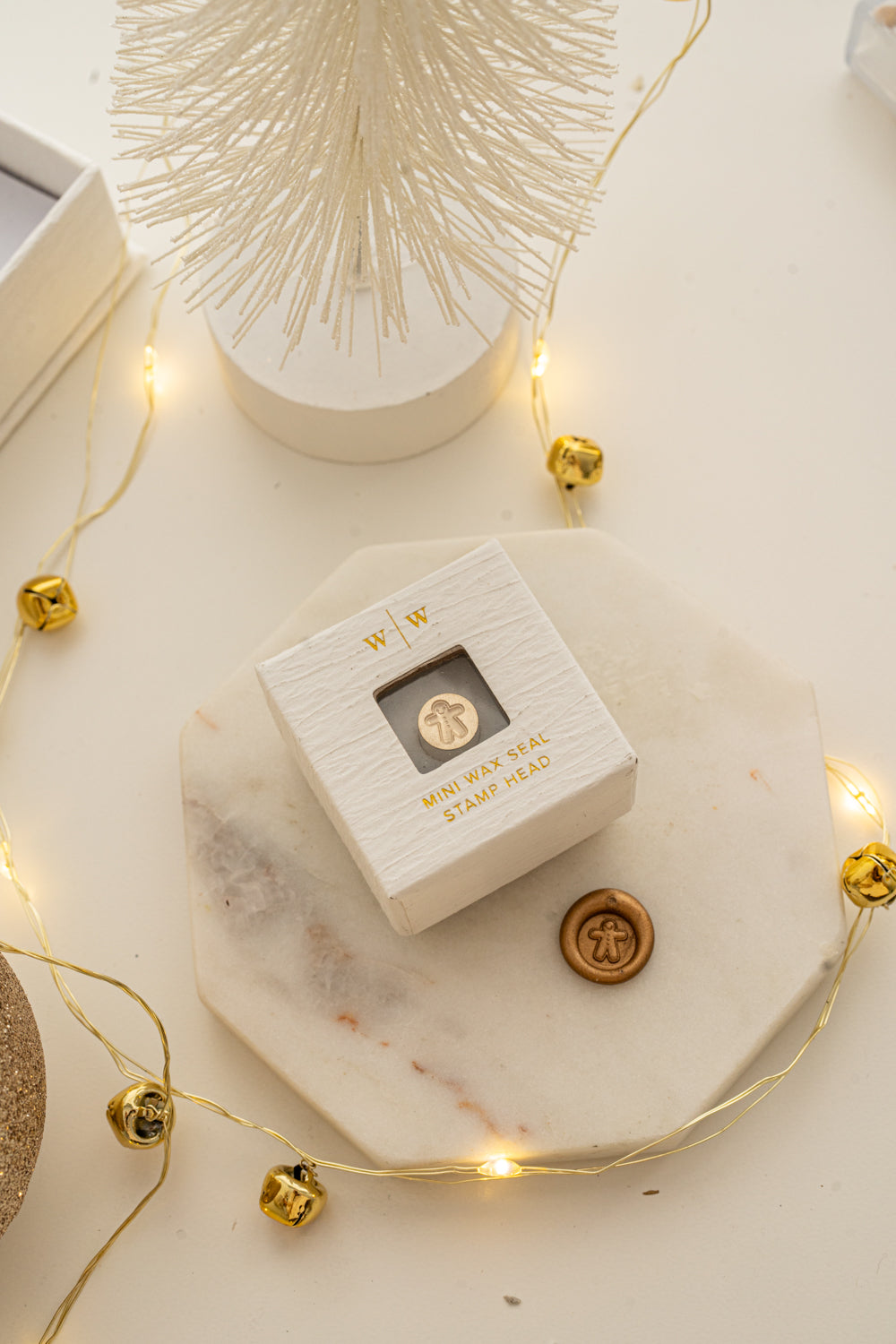 Boxed mini wax seal stamp with gingerbread man design and gold wax impression, part of Written Word Calligraphy’s Holiday Collection.