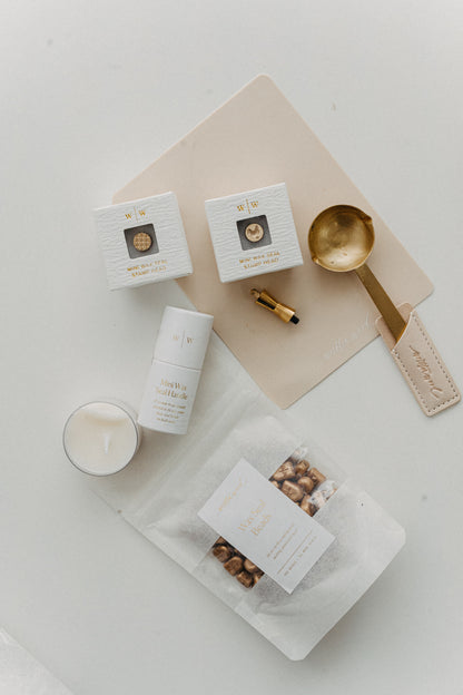 DIY wax seal kit with mini stamp heads, sealing wax beads, spoon and handle