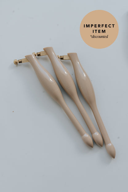 Three beige universal nib and container pens on a white background with 'imperfect item' label.