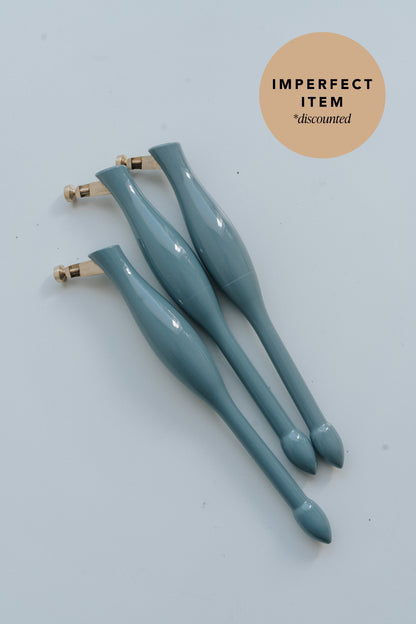 Three blue universal nib and container pens on a white background with 'imperfect item' label.