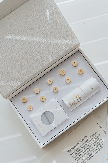 Open mini wax seal head set with number stamps, handle, and accessories in luxury box