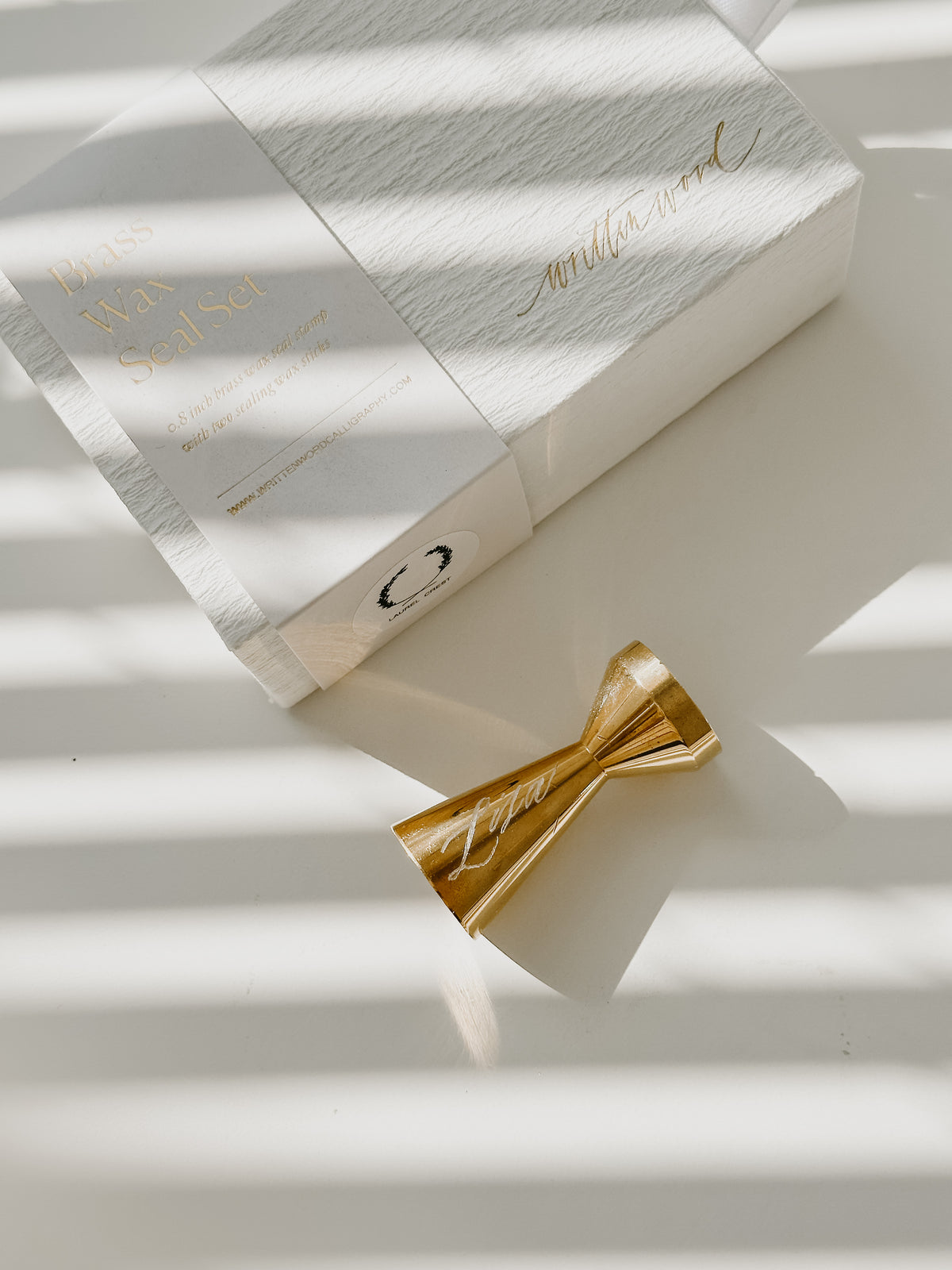 Luxury brass wax seal stamp set gift box with personalized engraved brass handle, elegant packaging, and custom wax seal supplies for wedding invitations, calligraphy, and stationery lovers.