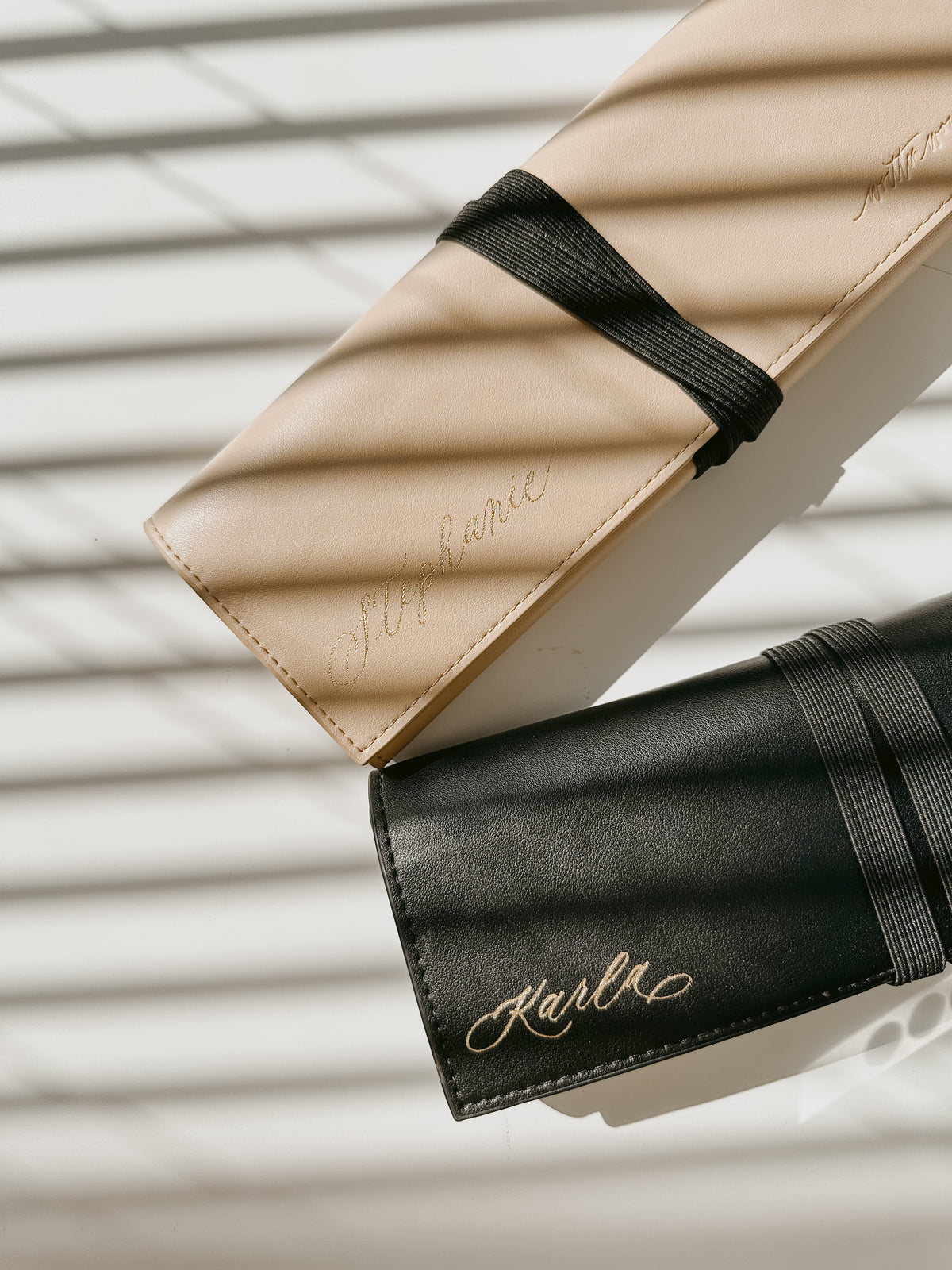 Close-up of personalized vegan leather pen roll with custom calligraphy name engraving, elegant pen storage case and thoughtful gift for creatives and lettering enthusiasts.