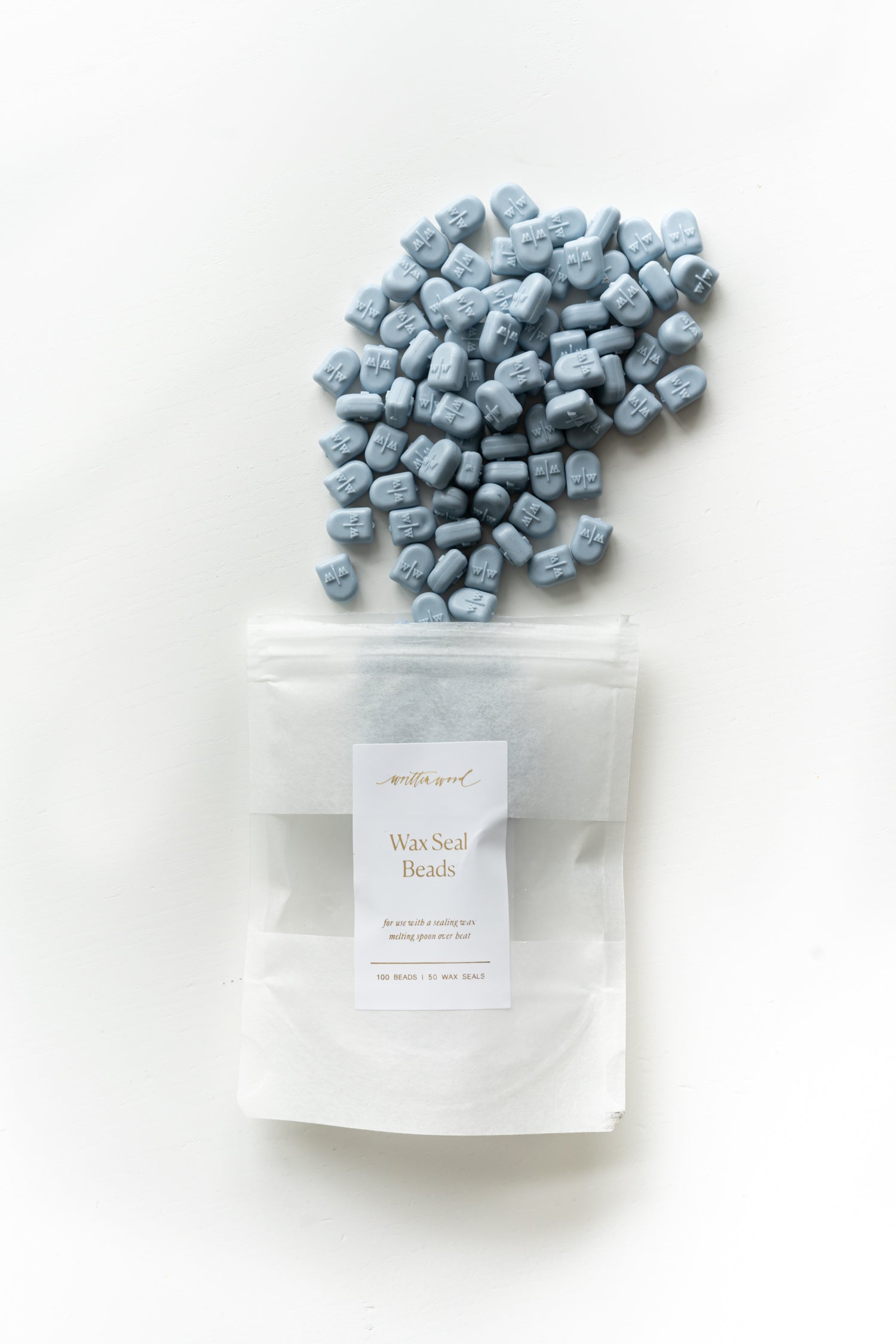 Dusty blue wax seal beads with packaging for DIY wax sealing and wedding stationery