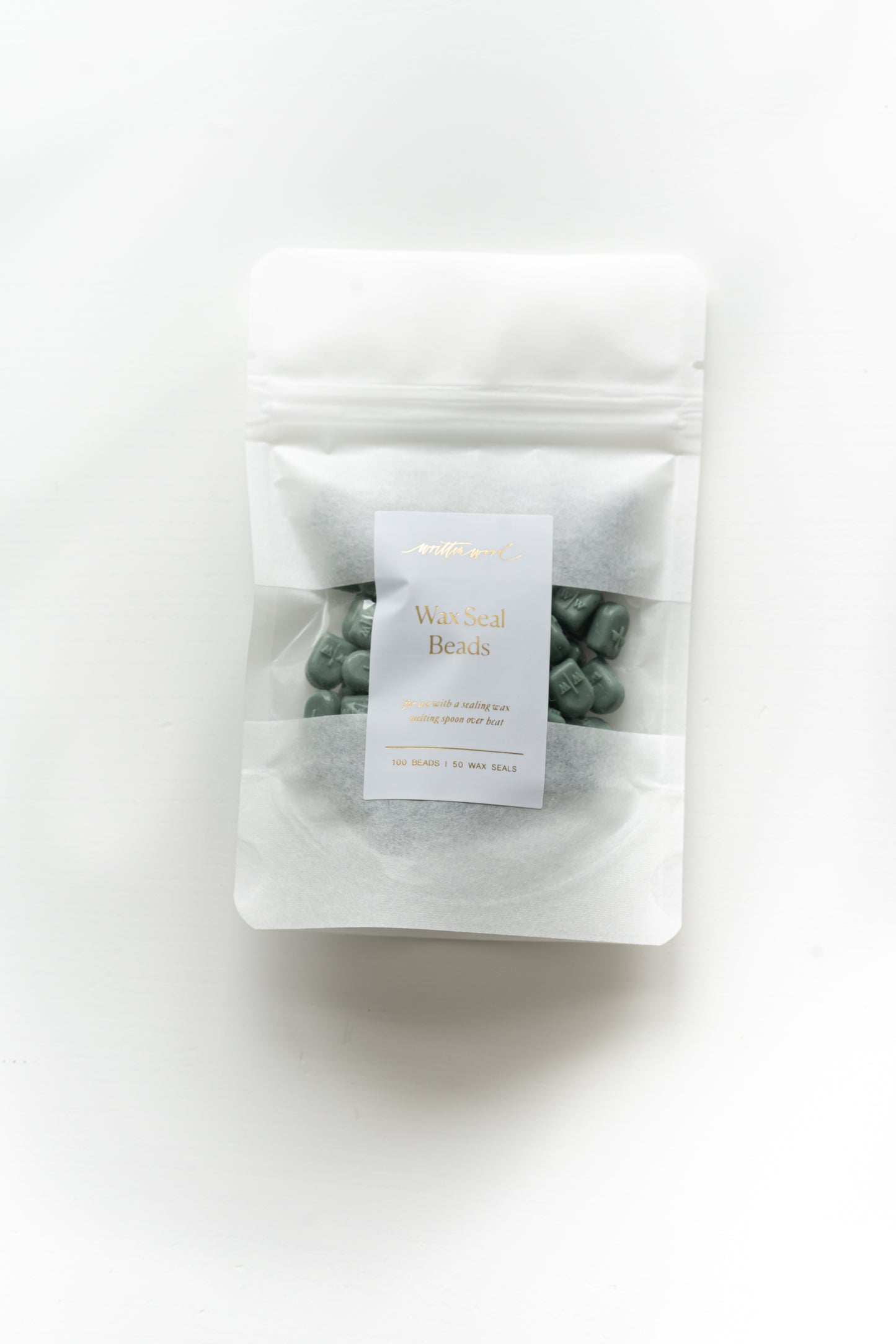 Wax seal beads in forest green, packaged for calligraphy wax sealing use