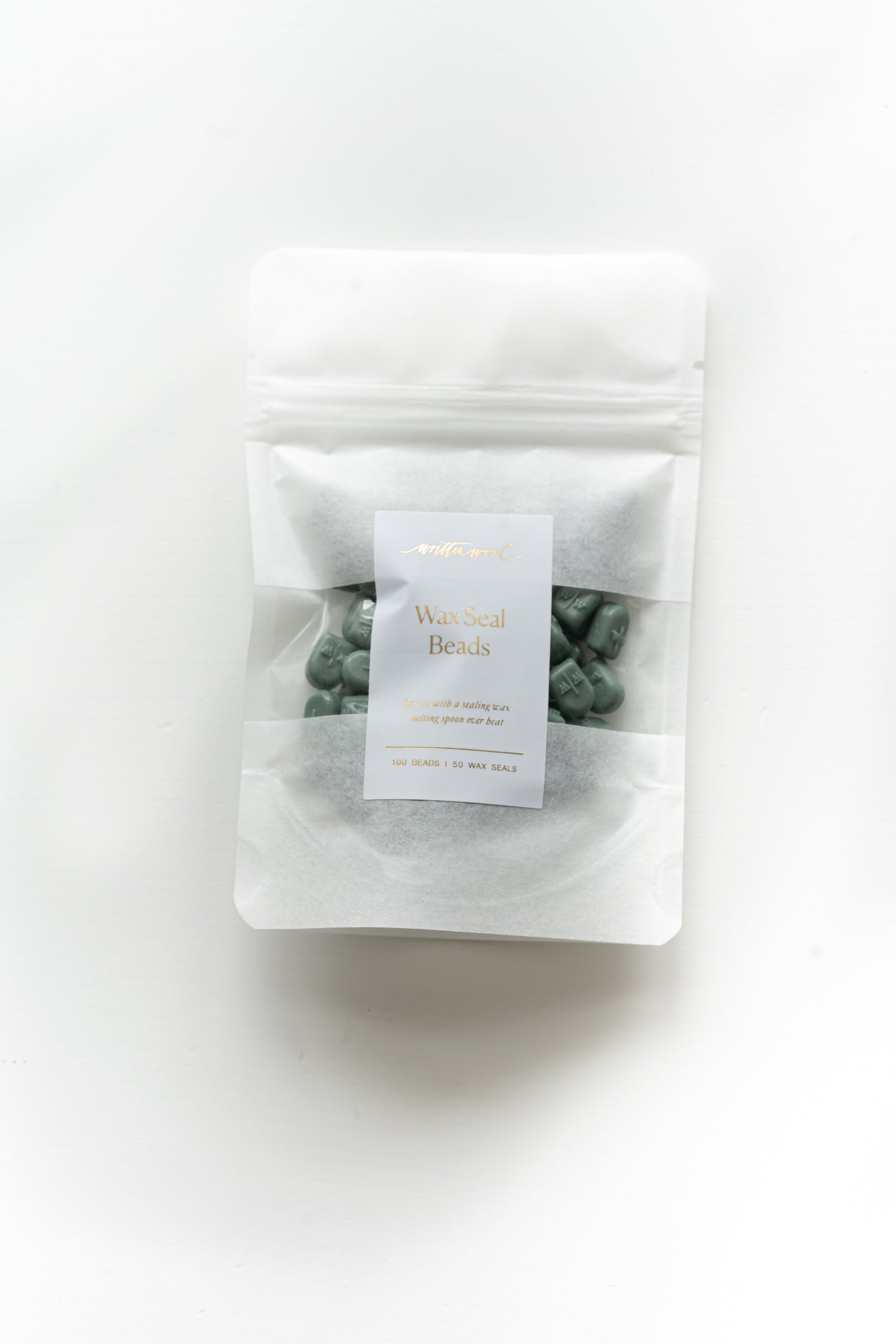 Wax seal beads in forest green, packaged for calligraphy wax sealing use