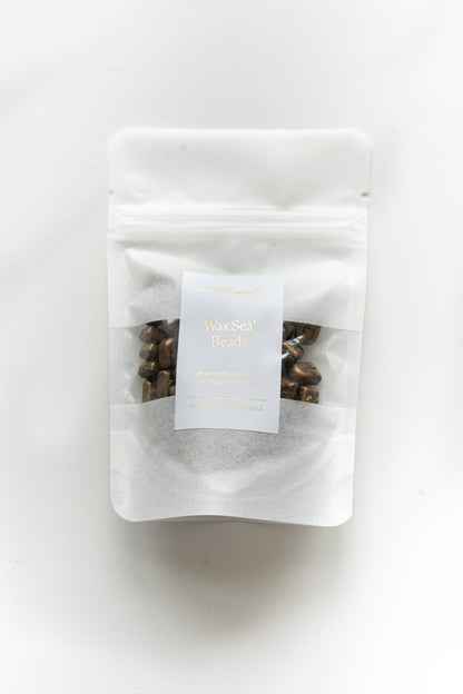 Packaged gold wax seal beads in resealable pouch for wax seal stamping