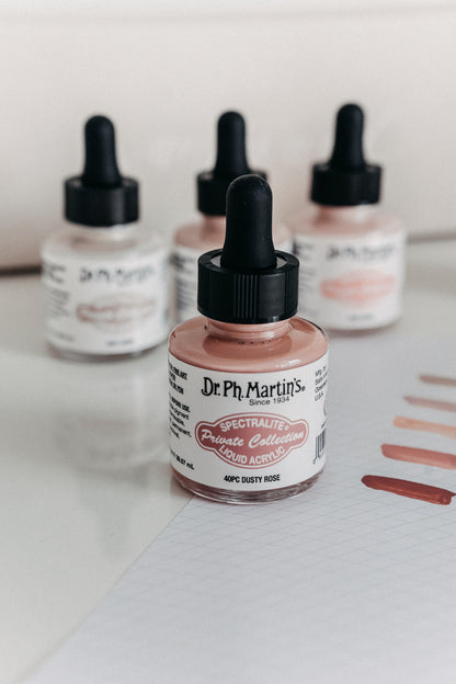 Dr. Ph. Martin's Spectralite Private Collection liquid acrylic ink in dusty rose, with swatches displayed on slanted paper