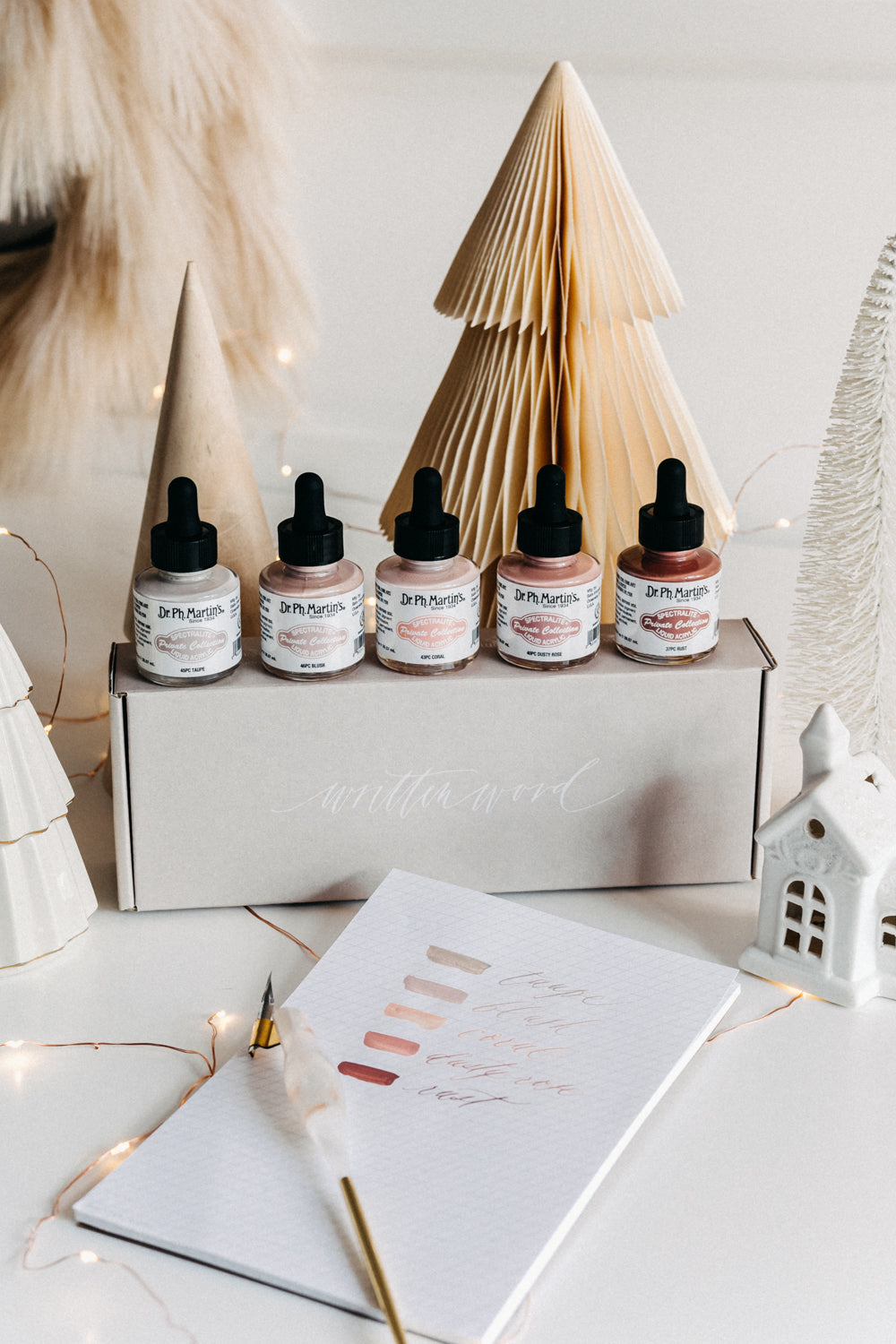 Dr. Ph. Martin's warm tone ink set with five shades: taupe, blush, coral, dusty rose, and rust for calligraphy