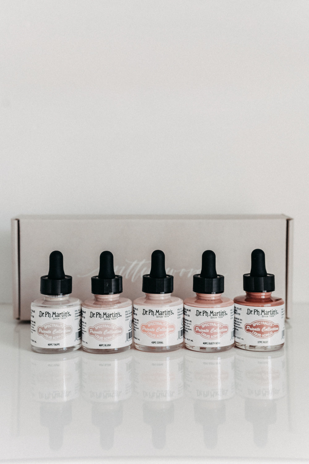 Dr. Ph. Martin's exclusive warm tone calligraphy ink set in taupe, blush, coral, dusty rose, and rust colors