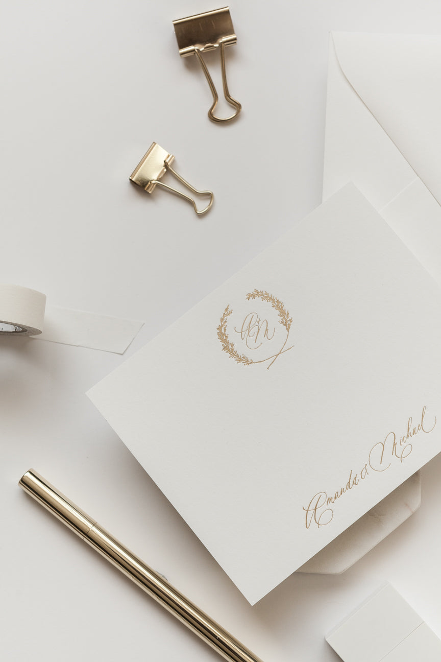Custom wedding stationery set with gold foil monogram, envelope liner, and modern calligraphy details
